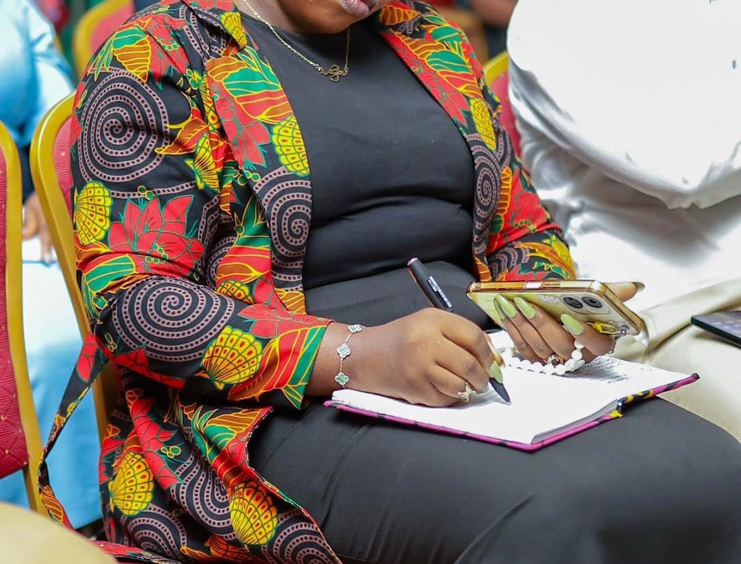 a lady jotting during service